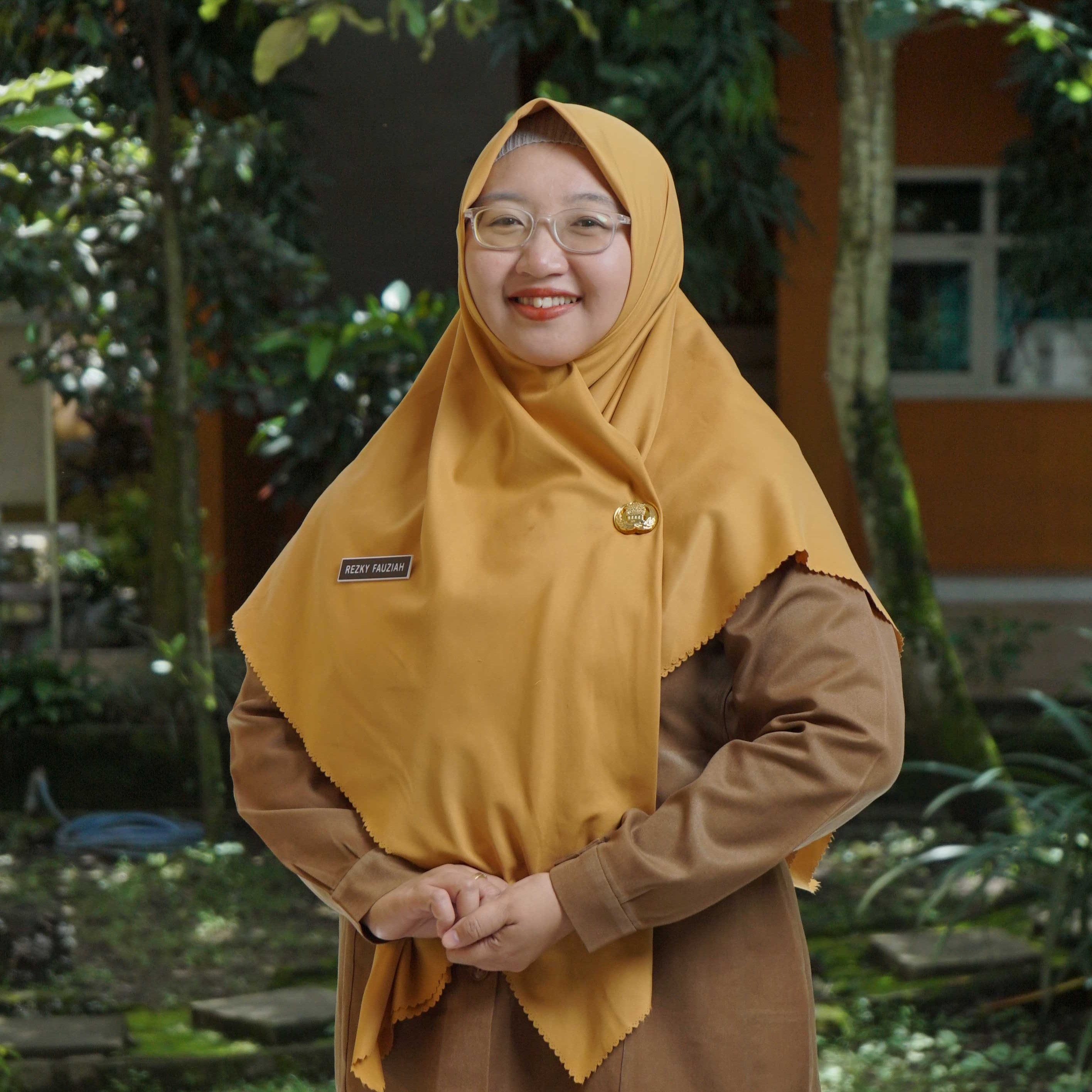 Rezky Fauziah, S.PdI.