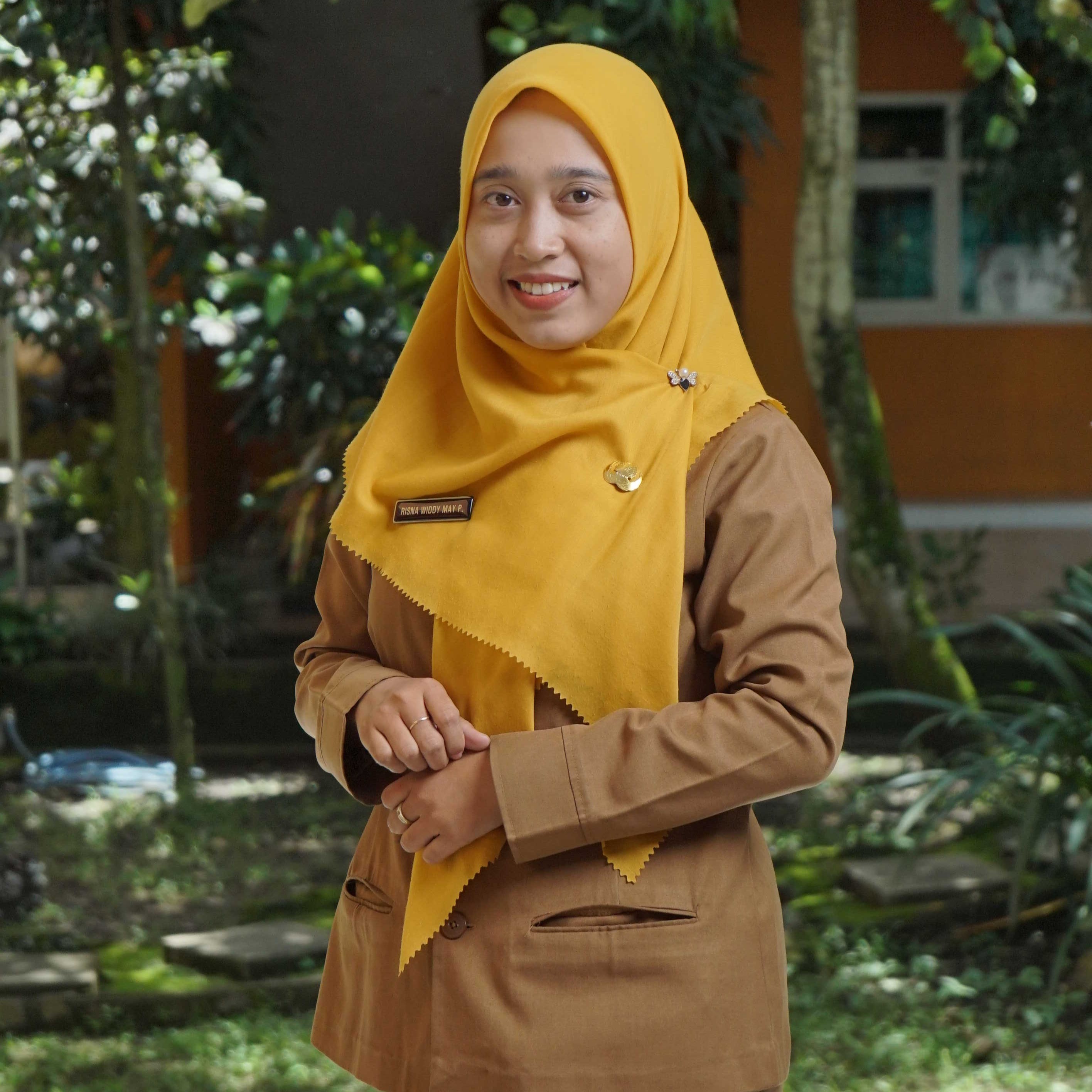 Risna Widdy May Pamilu, S.Pd.
